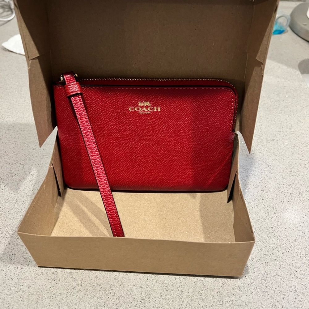 Brand new Coach wristlet.